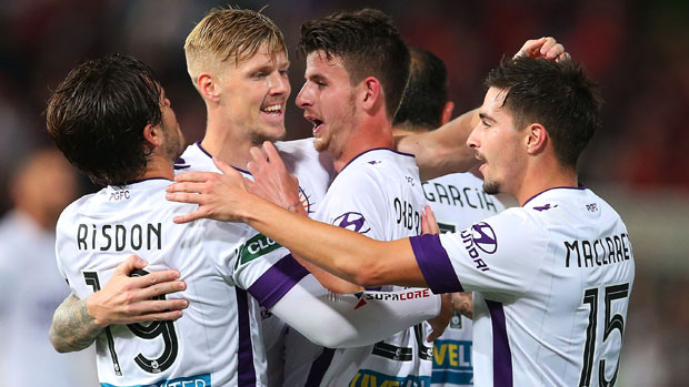 Glory players celebrate Andy Keogh's goal against the Wanderers.