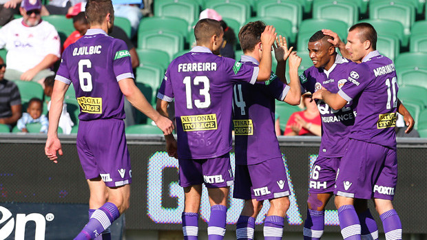 Glory players celebrate Sidnei's opening goal against the Reds.