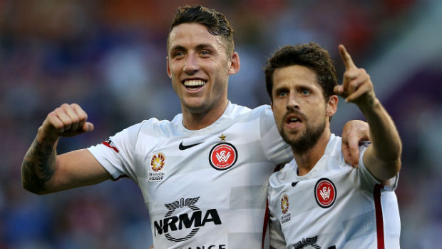 Wanderers midfielder Andreu celebrates converting a penalty against the Jets in Round 5 with teammate Scott Neville.