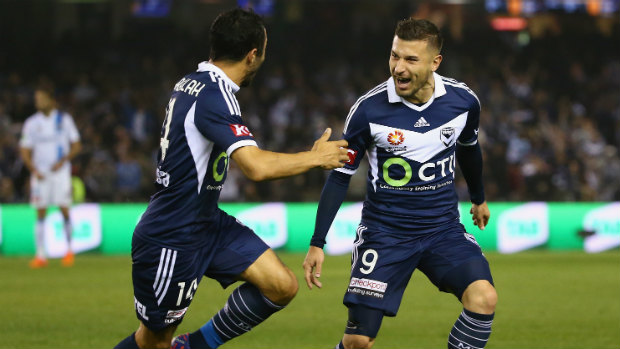 Victory's Kosta Barbarouses celebrates his spectacular goal against City.