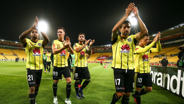 Vince celebrates with teammates following the 3-0 win over Melbourne Victory