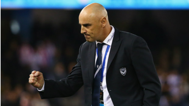 Kevin Muscat celebrates Melbourne Victory's win over City at full-time.