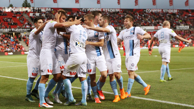 Melbourne City players celebrate Erik Paartalu's opener against the Reds on Thursday night.