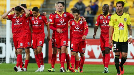 Reds reach summit after putting four past Phoenix